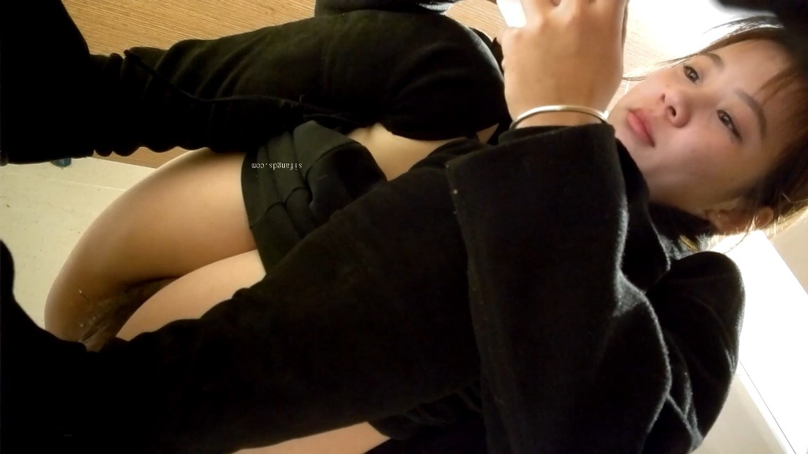 Hidden Cam Chinese Girl in Black Outfit Squatting and Peeing